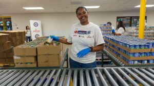 Los Angeles Clippers volunteer at the LA Regional Food Bank's distribution center at City of Industry, CA.