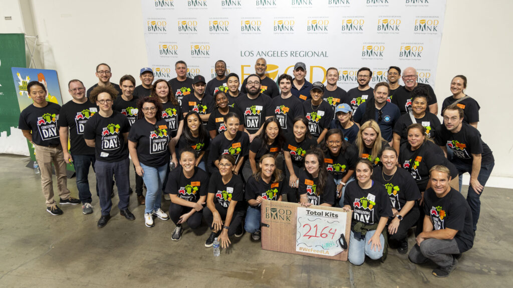 Los Angeles Dodgers players and wives pose with volunteers at Los Angeles  Dodgers Foundation and MLB All-Star Legacy initiative project, Friday, July  8, 2022, in Los Angeles. From left: David Price and